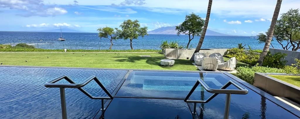 Stainless steel pool railings overlooking the ocean on Maui
